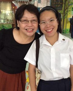 Mrs Liza Ow and student