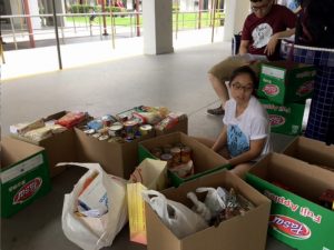 Sorting the collected canned and dry goods