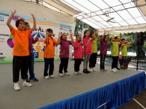 APSN Chaoyang School students performing to the crowd